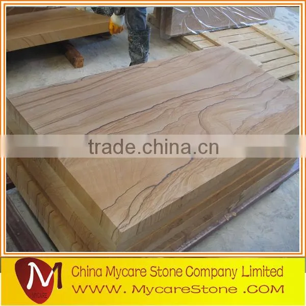 Polished sandstone paving