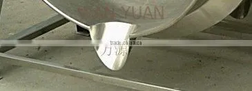 50 gallon tilting jacketed cooking pot with Teflon scrapers