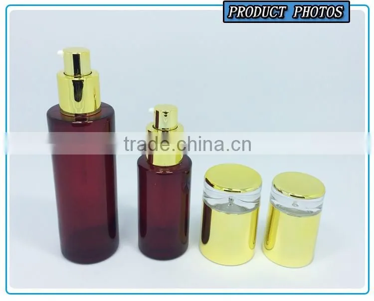 Empty green colored glass cosmetic bottle and cosmetic glass cream jar
