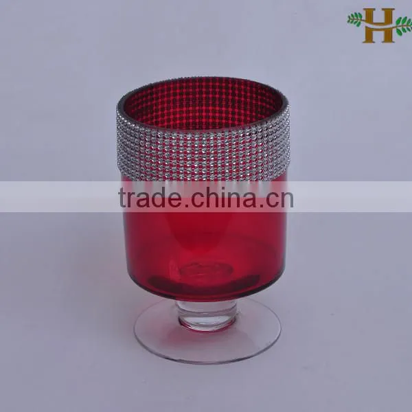Red glass candle holders with dimond decoration