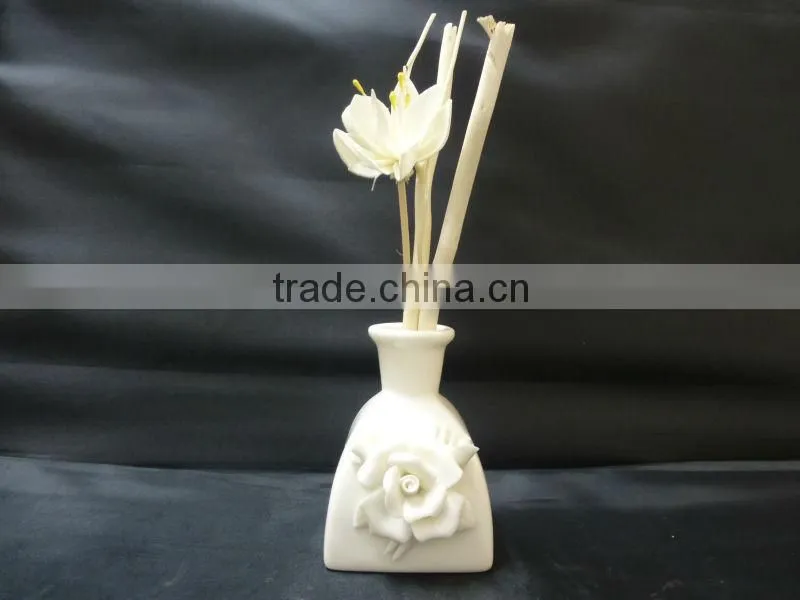 white ceramic oil diffuser with rose