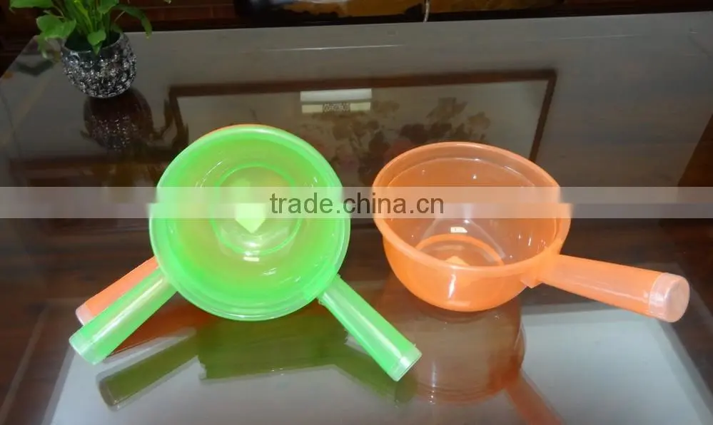 Clear plastic water ladle and soup ladle