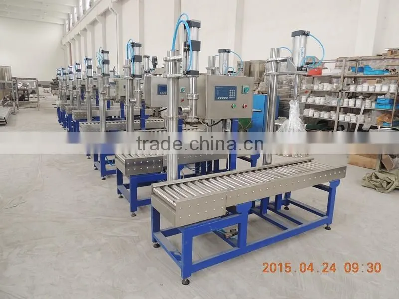 Drum/barrel weighing liquid filling and capping