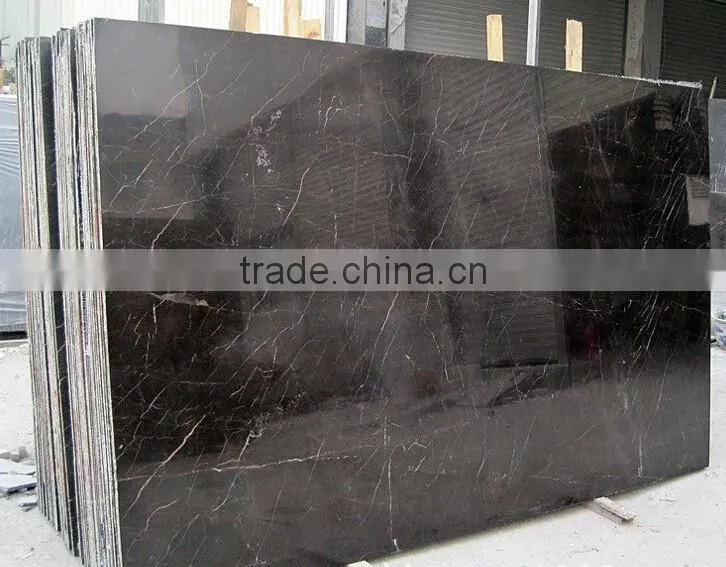 Gold inlaid with jade brown marble tiles and slabs