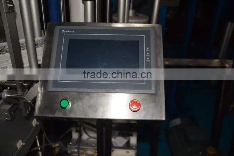 Sipuxin_Semi-automatic double sides flat plastic bottle labeling machine