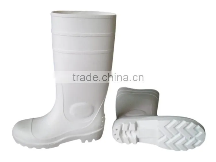 White PVC rain boots with steel toe