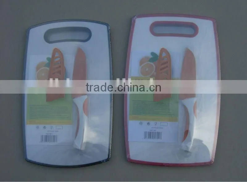 plastic cutting board and santoku knife