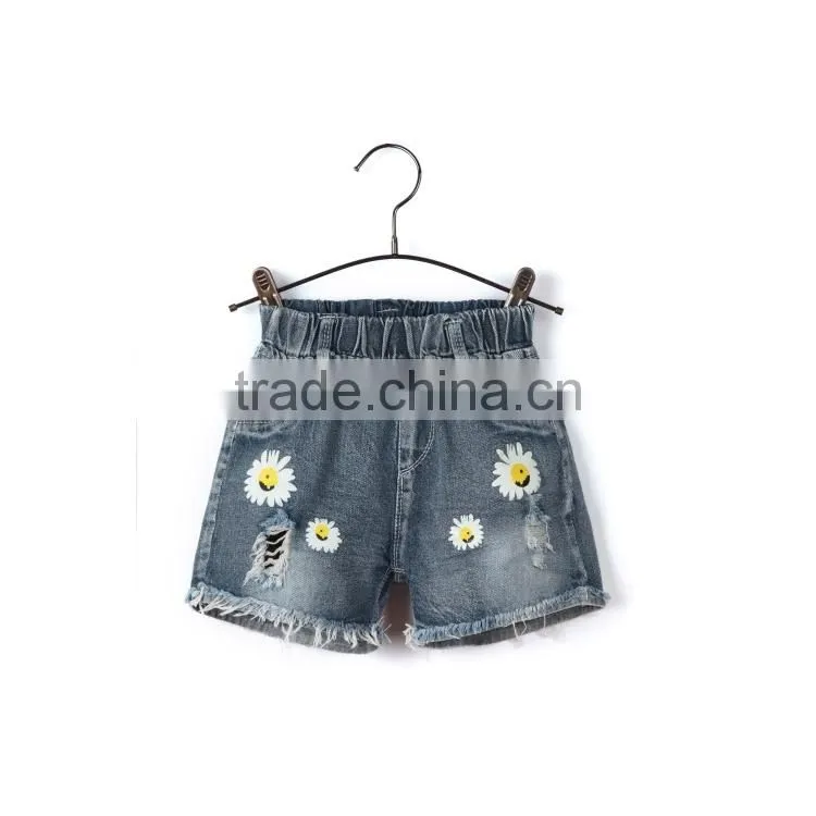 OEM service bulk wholesale sunflower print denim baby jeans with fray hem