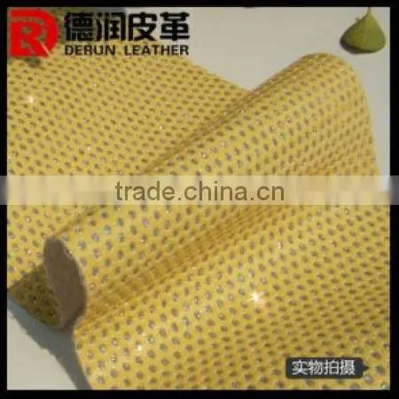 2013 fashion DERUN punching glitter leather fabric for bags