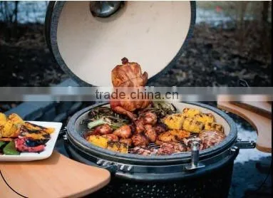Holland Clay charcoal egg bbq grill with brown iron table