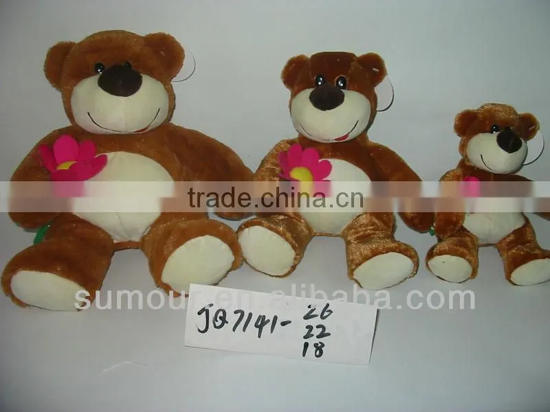 Cute Teddy Bear Plush Toy with a flower