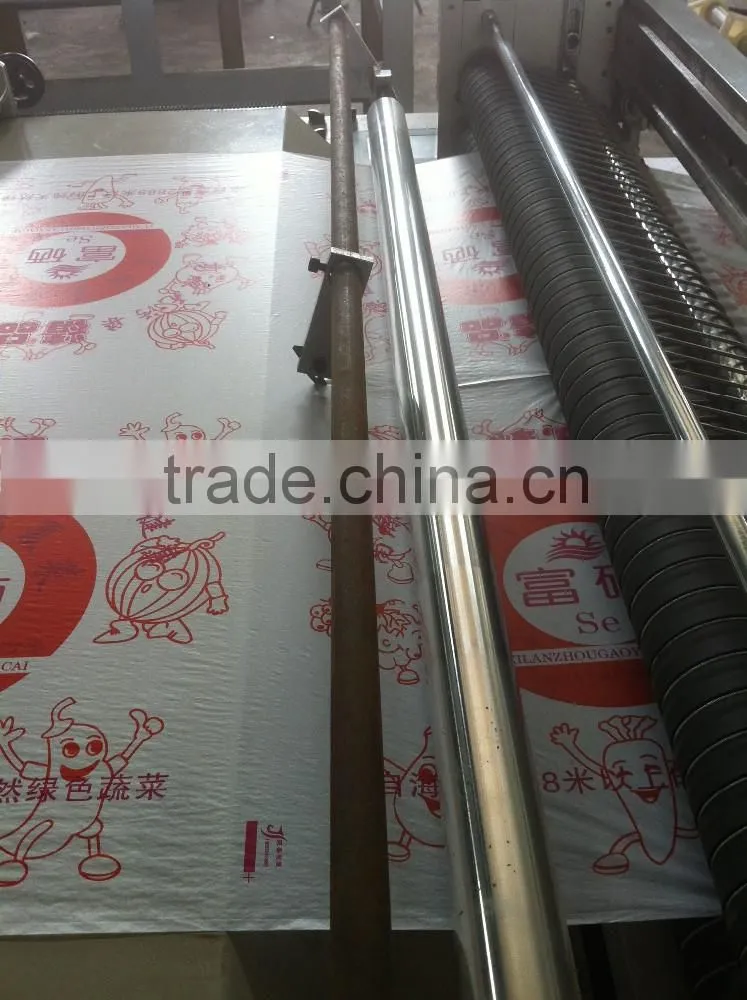 Economic type cake or bread oil on paper roll to sheets cutting machine