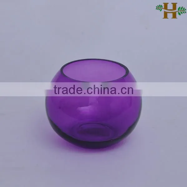 Hand blown colored glass candle holder