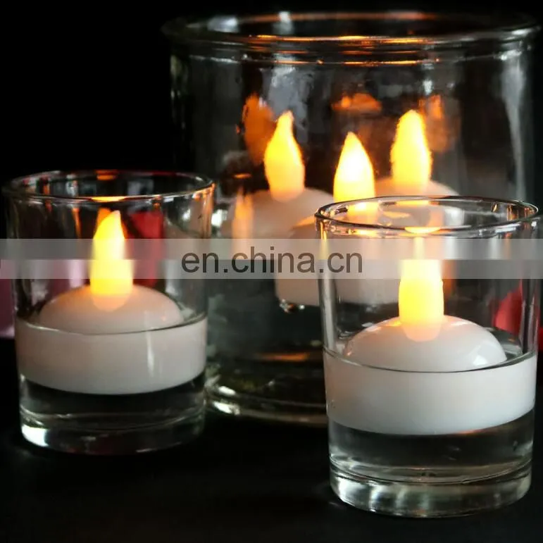 12 pieces per pack waterproof battery operated glitter candle light color changing floating led candle with swirling glitter