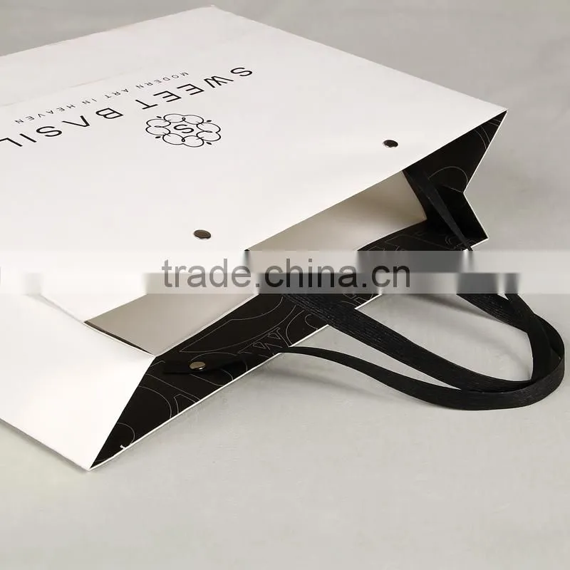 Recyclable medium hand length handle specialty paper bag for shopping packaging