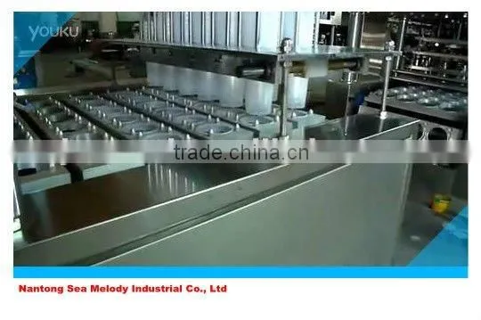 Curd cup sealing machine
