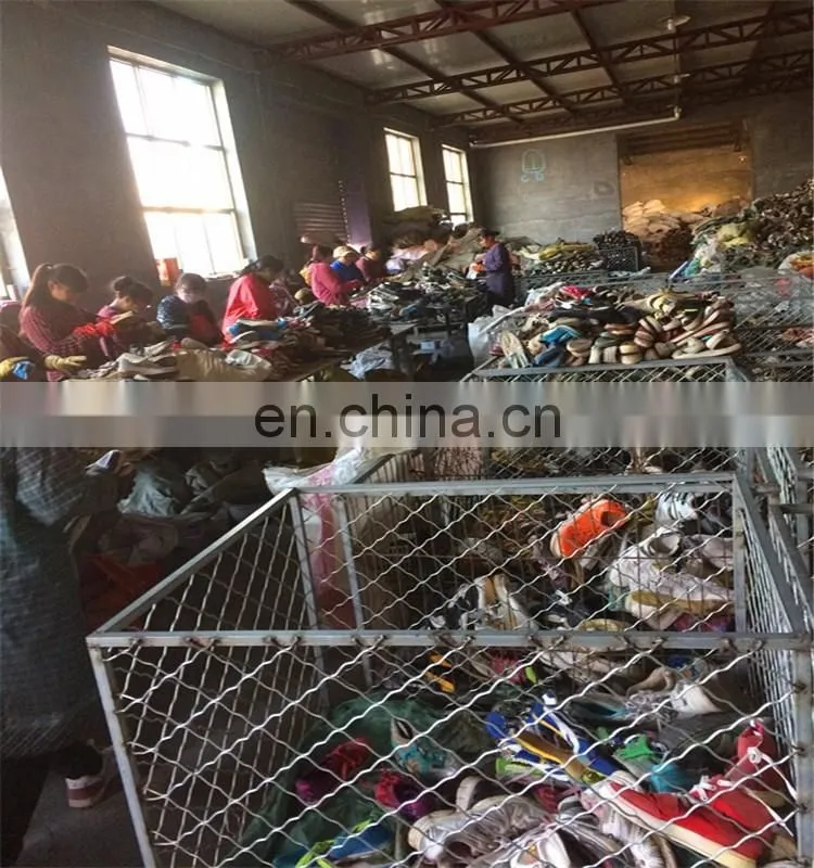 Cheap wholesale used shoes in china/second hand clothes in bales for uganda