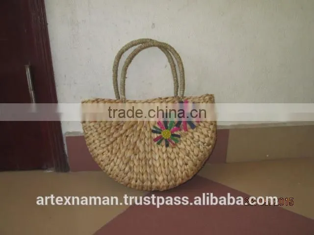 Eco-friendly water hyacinth handbag with handles, fashionable looking, good price, natural material from Vietnam
