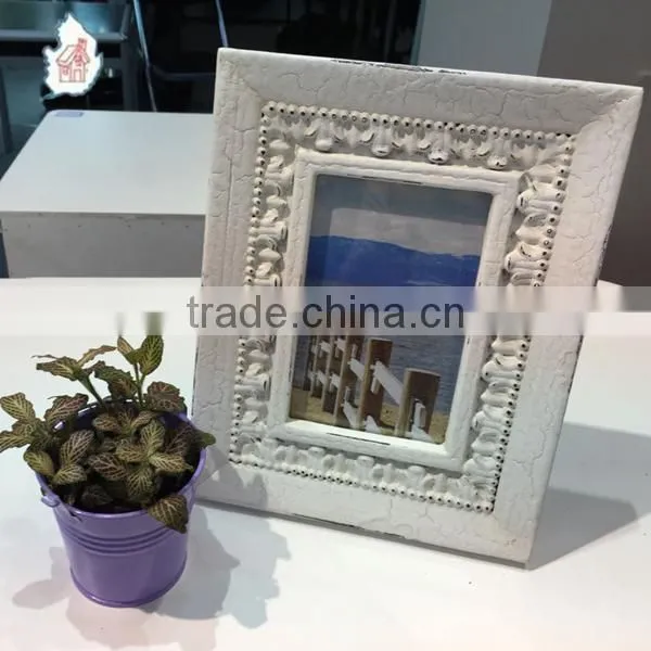 White color photo picture frame with smooth surface and crack painting frame