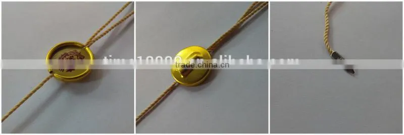 Cheap high-grade environmental protection non-toxic gilt metal plastic seal tag / string seal men string
