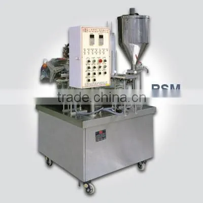 Automatic rotary cup filling and sealing machine
