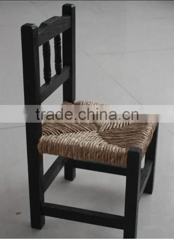 beautiful solid wood chair with ratten weave for children