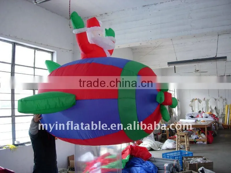 Inflatable santa claus sitting on aircraft for sale