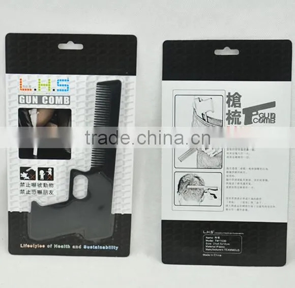 Hot sale cute gun shape plastic printed comb