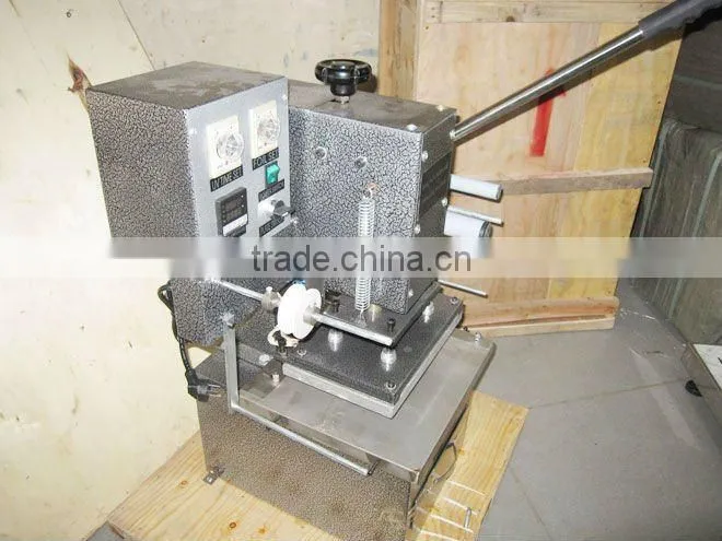 Manual date stamping machine