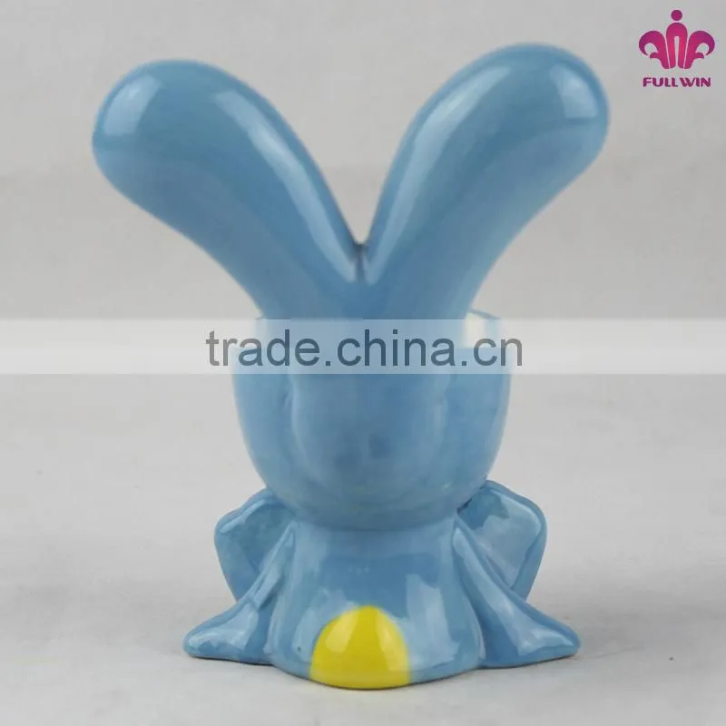 Ceramic egg holder with rabbit design