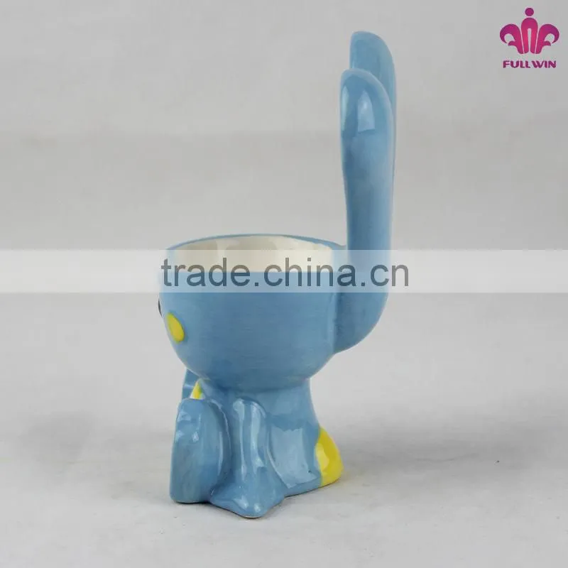 Ceramic egg holder with rabbit design