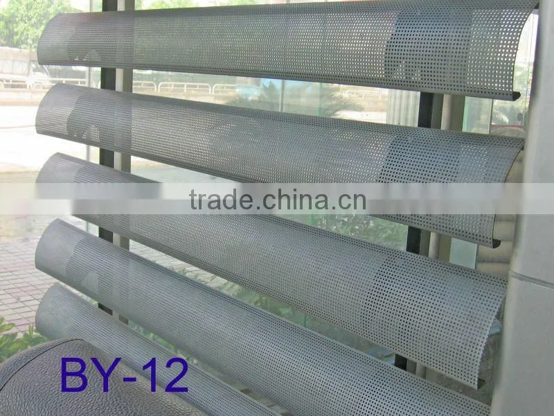 Curved perforated aluminum sun louver/screen (C E)