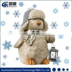 Regal Santa statue and Sledding Santa Figurine