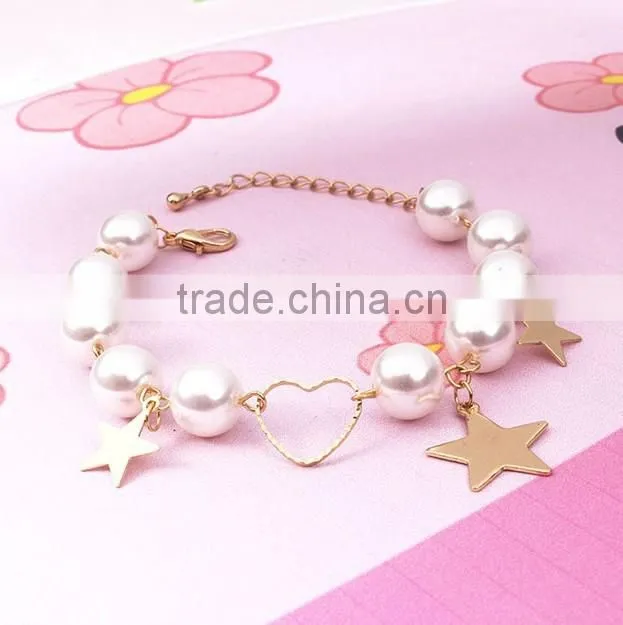 gold heart star charms pearl link bracelet