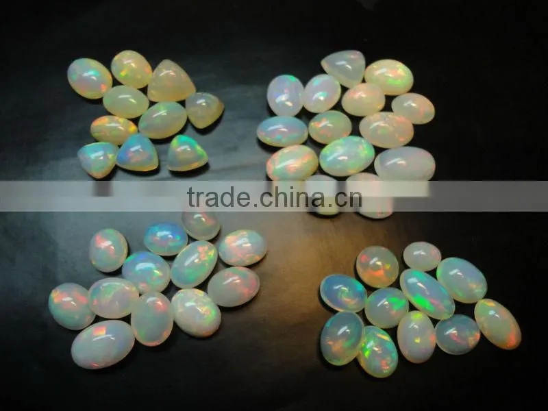 Natural Ethiopian Fire Opal oval cabochon cut beads