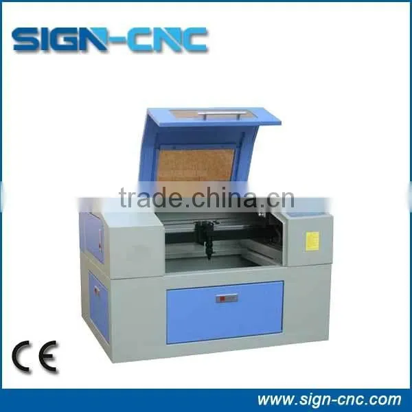Image cnc co2 acrylic textile marble granite wood ceramic laser engraving and cutting machine price