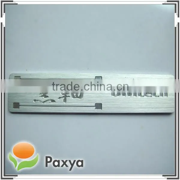 Metal logo ; Embossed metal label