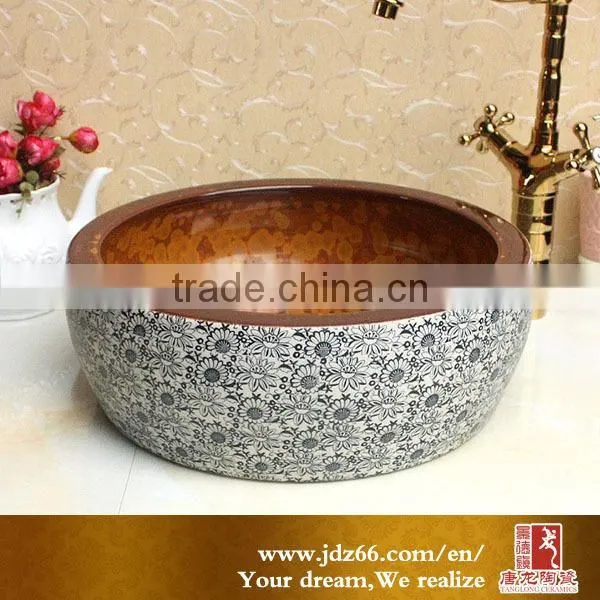 Beautiful and practical ceramic wash basin above washing machine