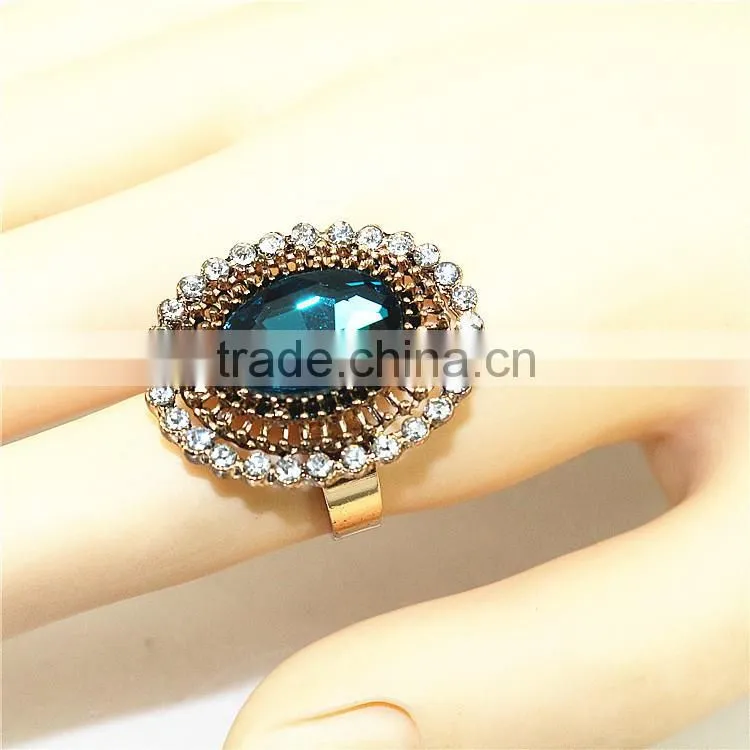 Big gold ring with big oval stone shape finger ring