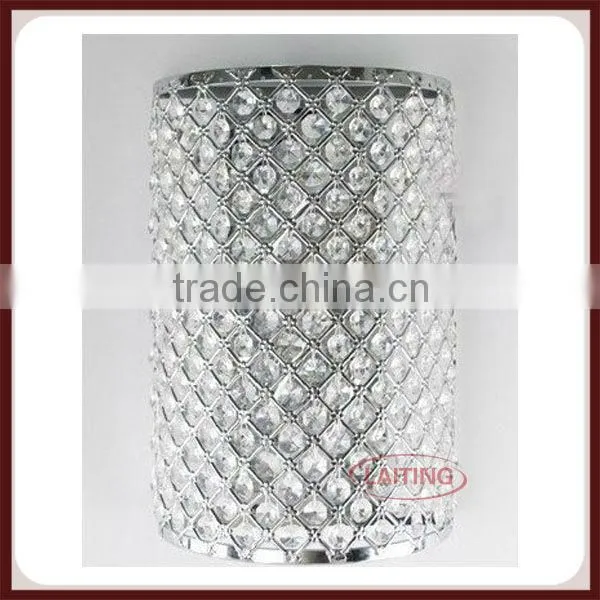Traditional barrel-shaped crystal wall light