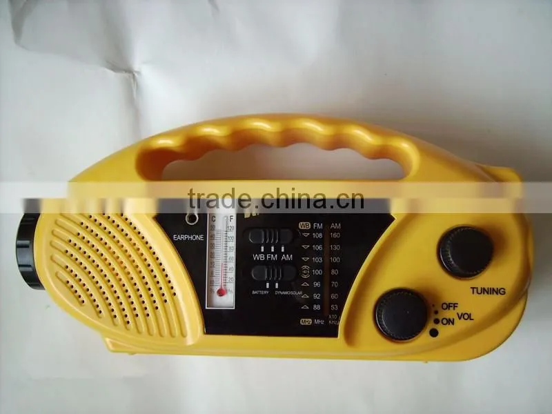 solar dynamo radio with LED torch and cell phone charger and thermometer