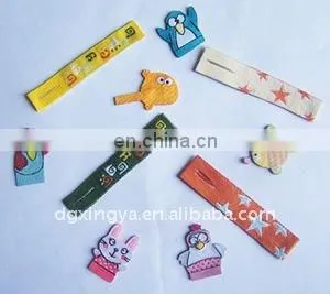 Laser pore woven zipper head puller with star