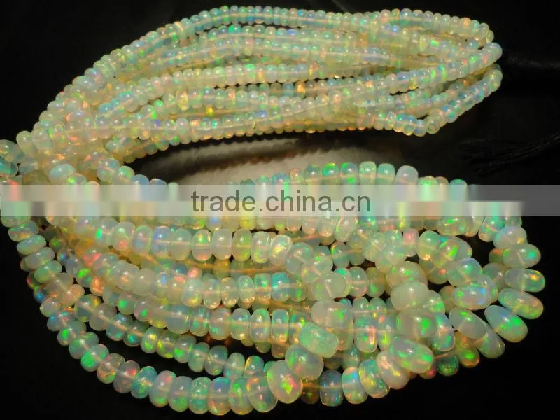 Natural Ethiopian Fire Opal oval cabochon cut beads