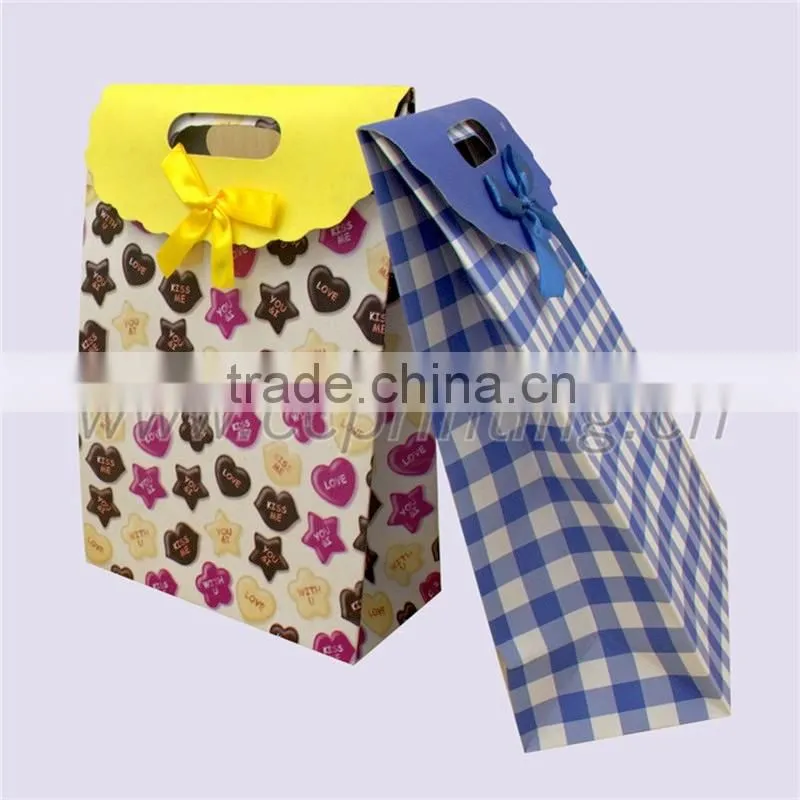 China custom kids birthday party gift paper bags with handles