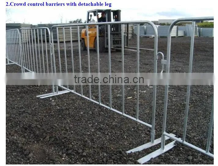 road barricade or pedestrian barrier/metal crowd control barrier at riot/event for crowd control