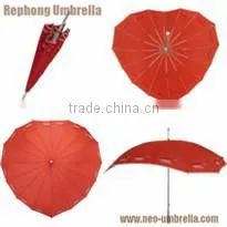 Red fold umbrella with white flower handle color match the fabric