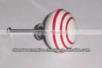 ceramic white knob with green circles