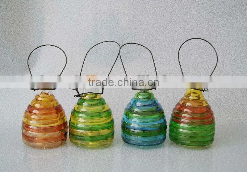 colored glass wasp bottle