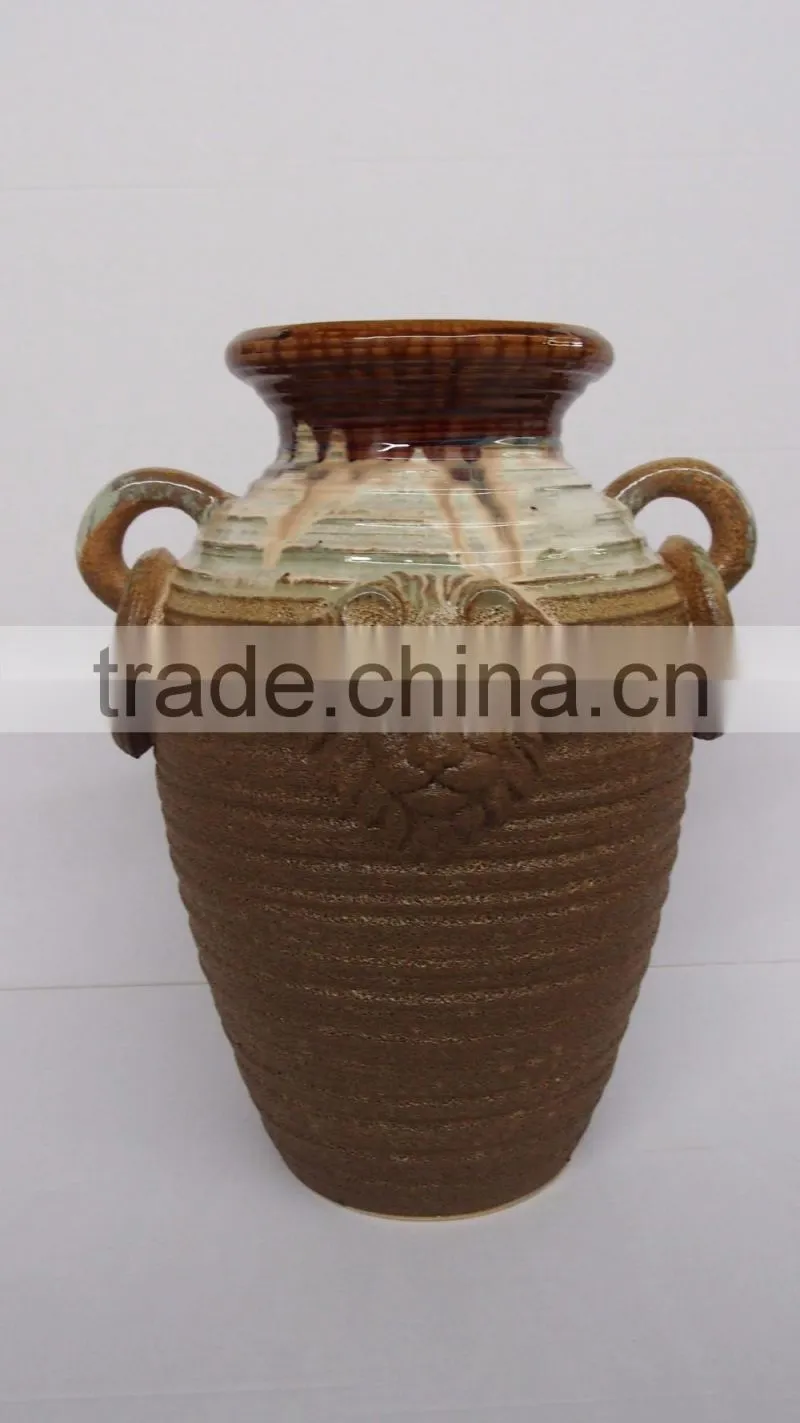 Pottery urn with antique finish