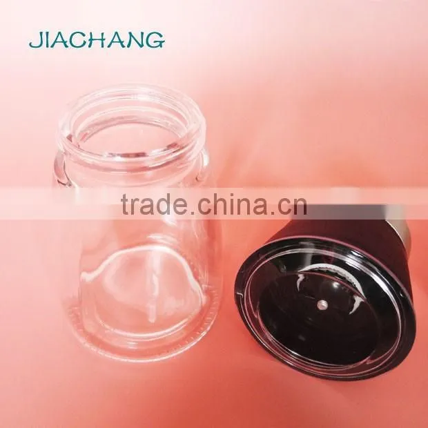 glass salt spice condiment jar with black grinder cap